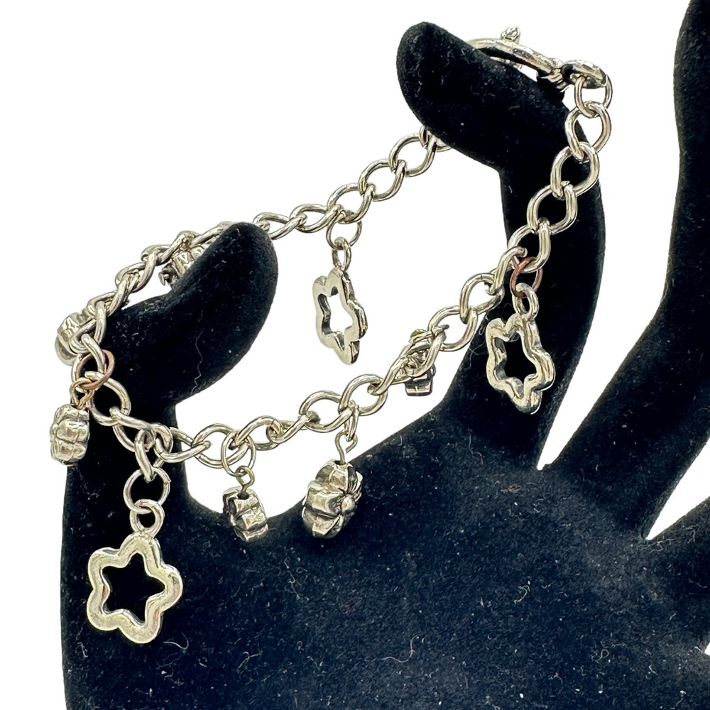 Silver toned‎ floral with star charm bracelet